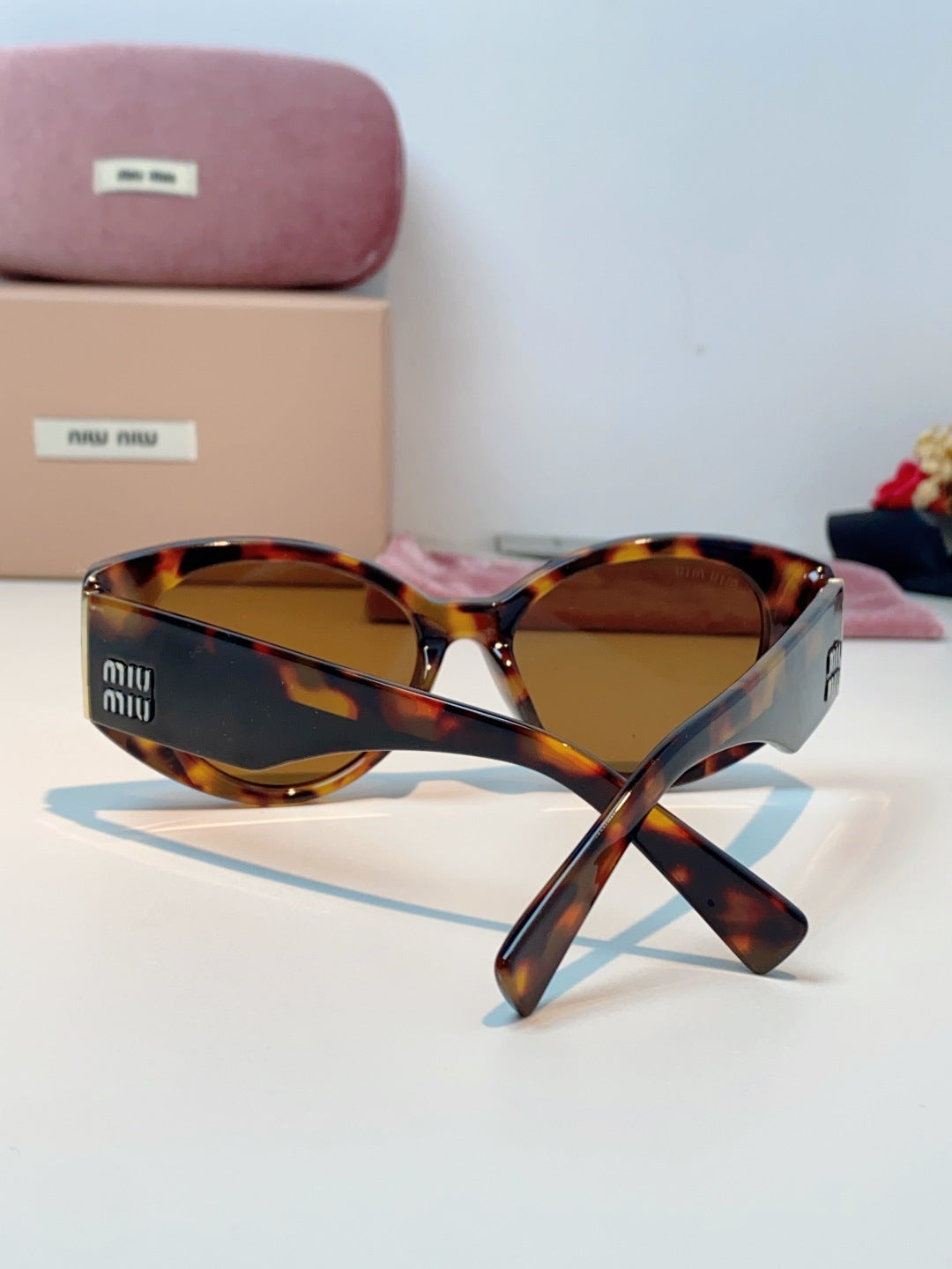Miu Miu Polarized Cat-Eye Brown Lens Sunglasses for Men & Women - detail image 3