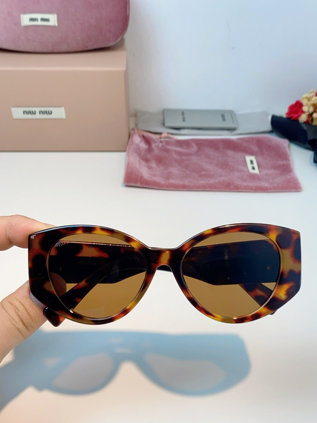 Miu Miu Polarized Cat-Eye Brown Lens Sunglasses for Men & Women - detail image 4