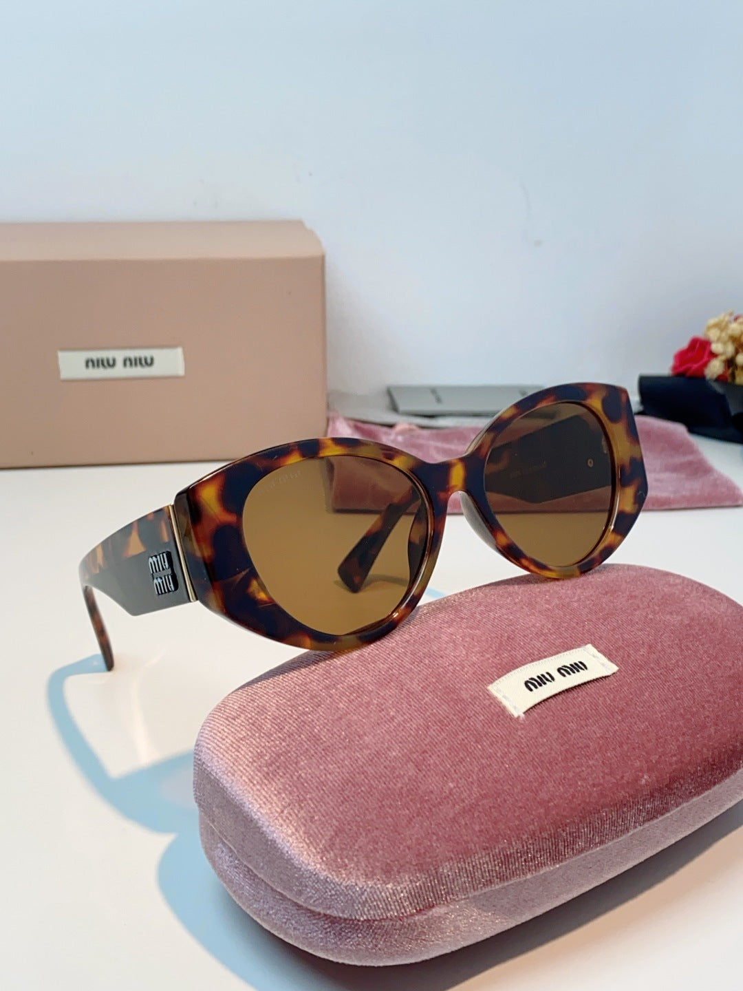Miu Miu Polarized Cat-Eye Brown Lens Sunglasses for Men & Women - detail image 9