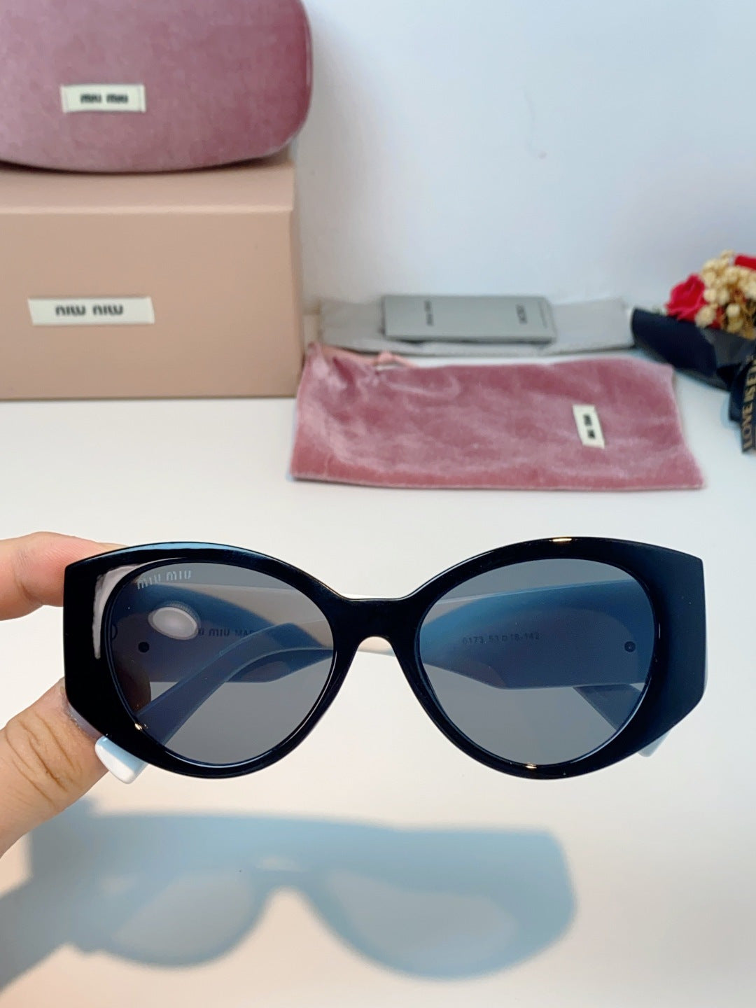 Miu Miu Polarized Cat-Eye Blue Lens Sunglasses for Men & Women - detail image 4