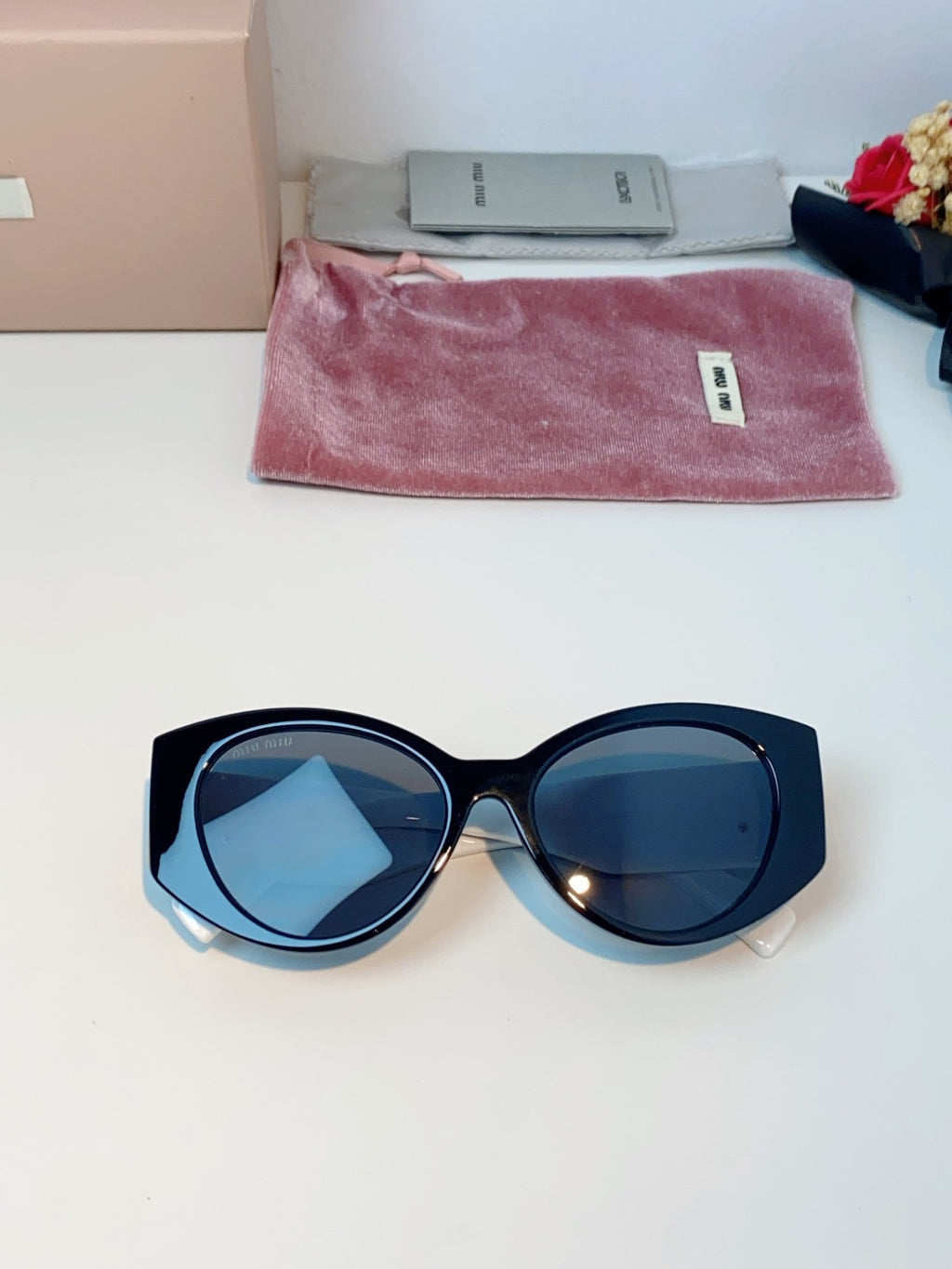 Miu Miu Polarized Cat-Eye Blue Lens Sunglasses for Men & Women - detail image 9