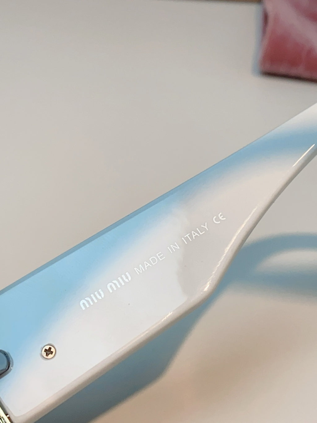 Miu Miu Polarized Cat-Eye Blue Lens Sunglasses for Men & Women - detail image 8