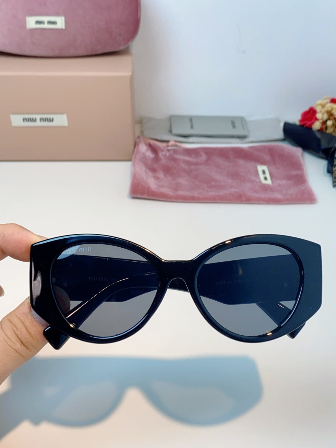 Miu Miu Polarized Cat-Eye Black Lens Sunglasses for Men & Women - detail image 4