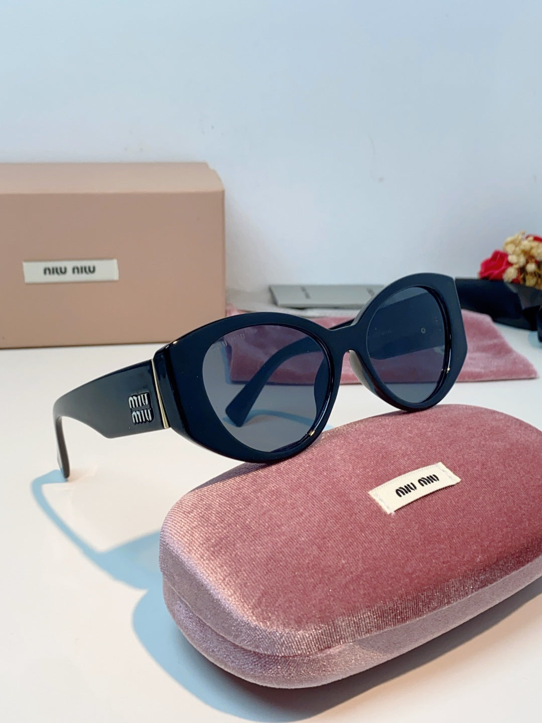 Miu Miu Polarized Cat-Eye Black Lens Sunglasses for Men & Women - detail image 10