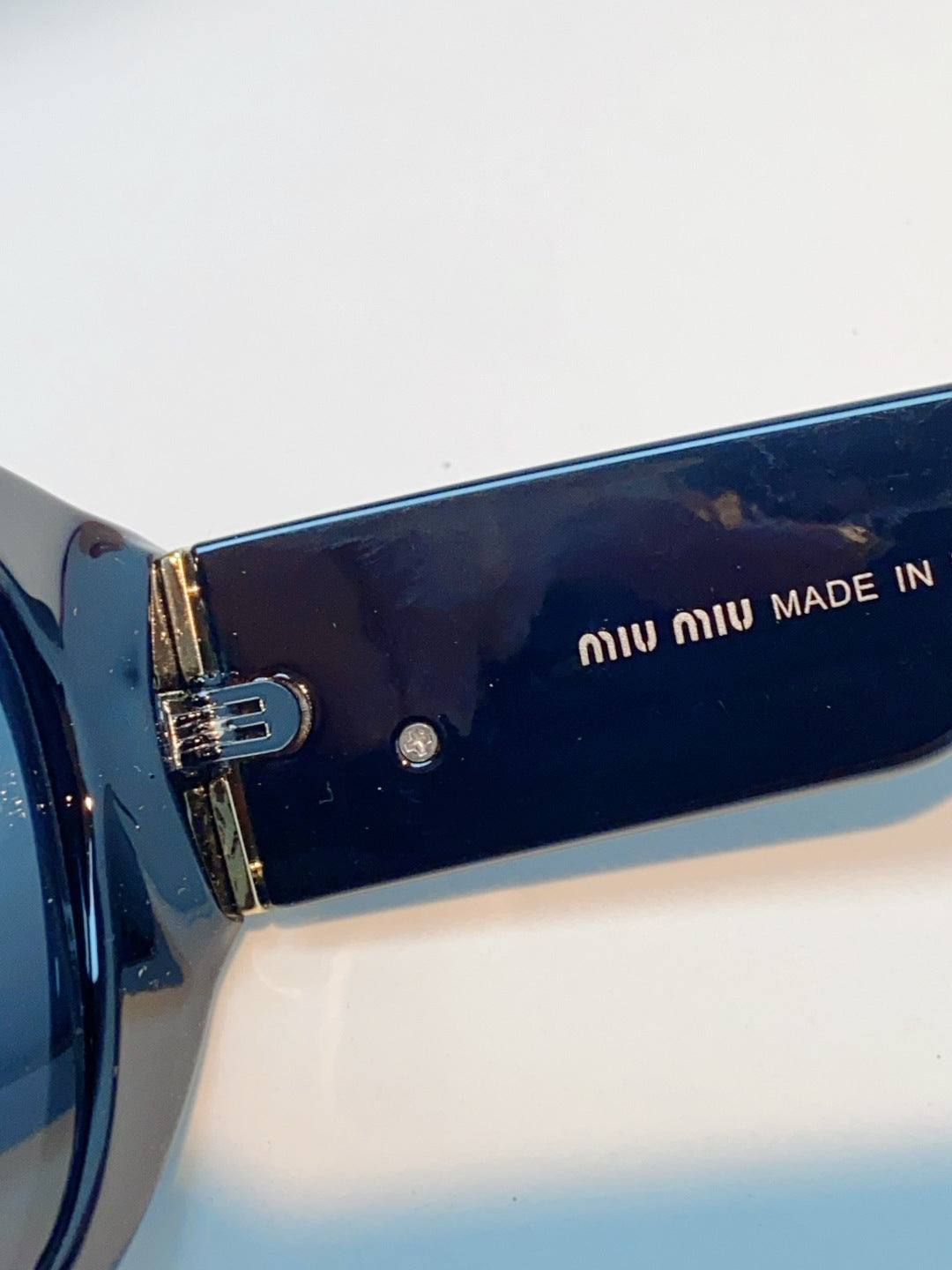 Miu Miu Polarized Cat-Eye Black Lens Sunglasses for Men & Women - detail image 8