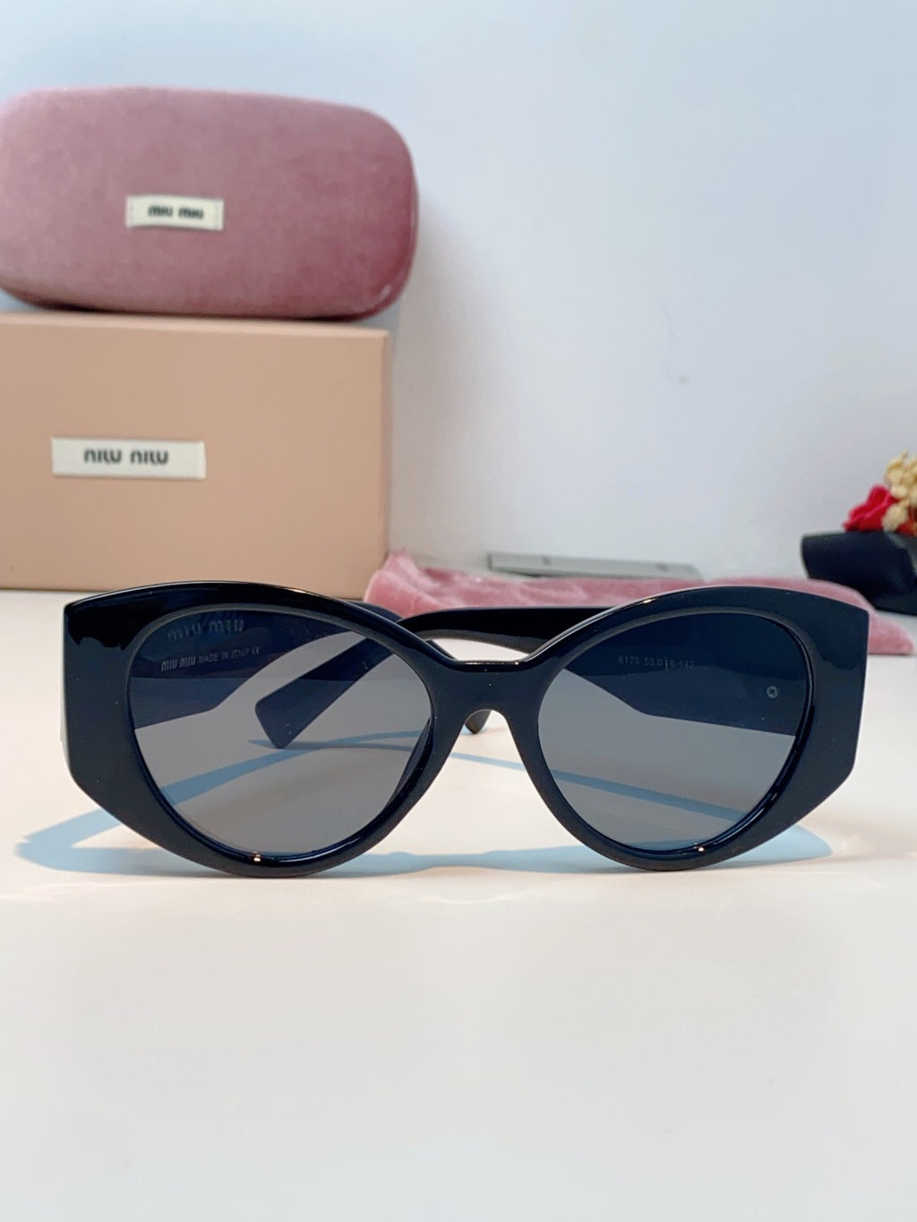 Miu Miu Polarized Cat-Eye Black Lens Sunglasses for Men & Women - detail image 2