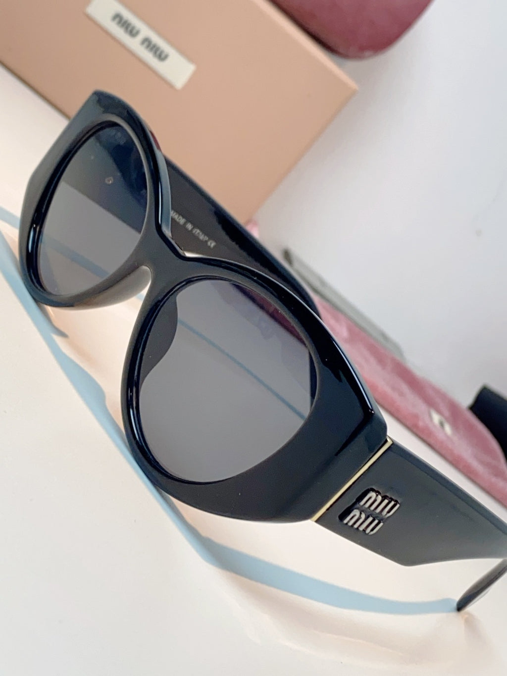 Miu Miu Polarized Cat-Eye Black Lens Sunglasses for Men & Women - detail image 7