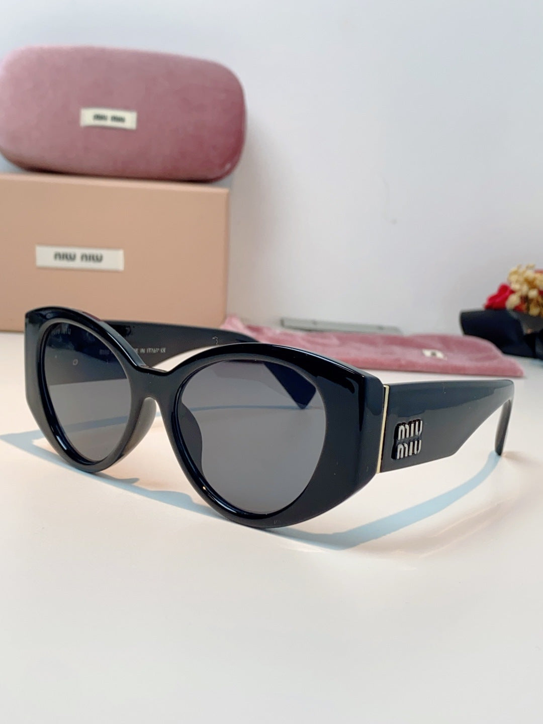 Miu Miu Polarized Cat-Eye Black Lens Sunglasses for Men & Women