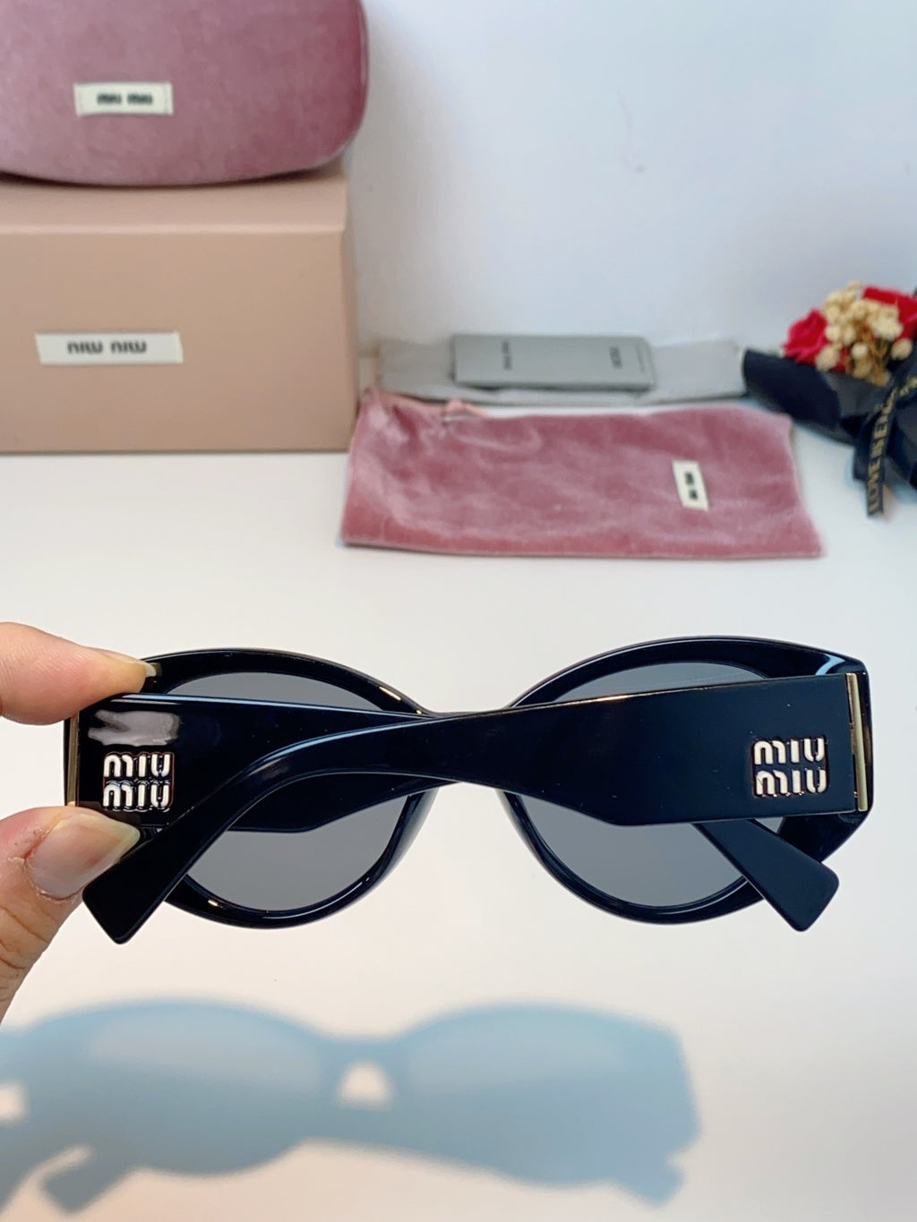 Miu Miu Polarized Cat-Eye Black Lens Sunglasses for Men & Women - detail image 5
