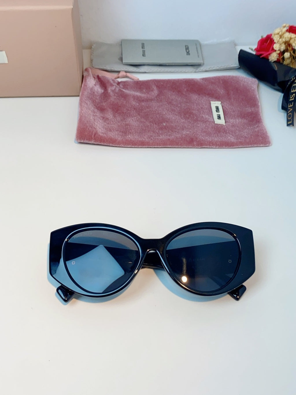Miu Miu Polarized Cat-Eye Black Lens Sunglasses for Men & Women - detail image 9