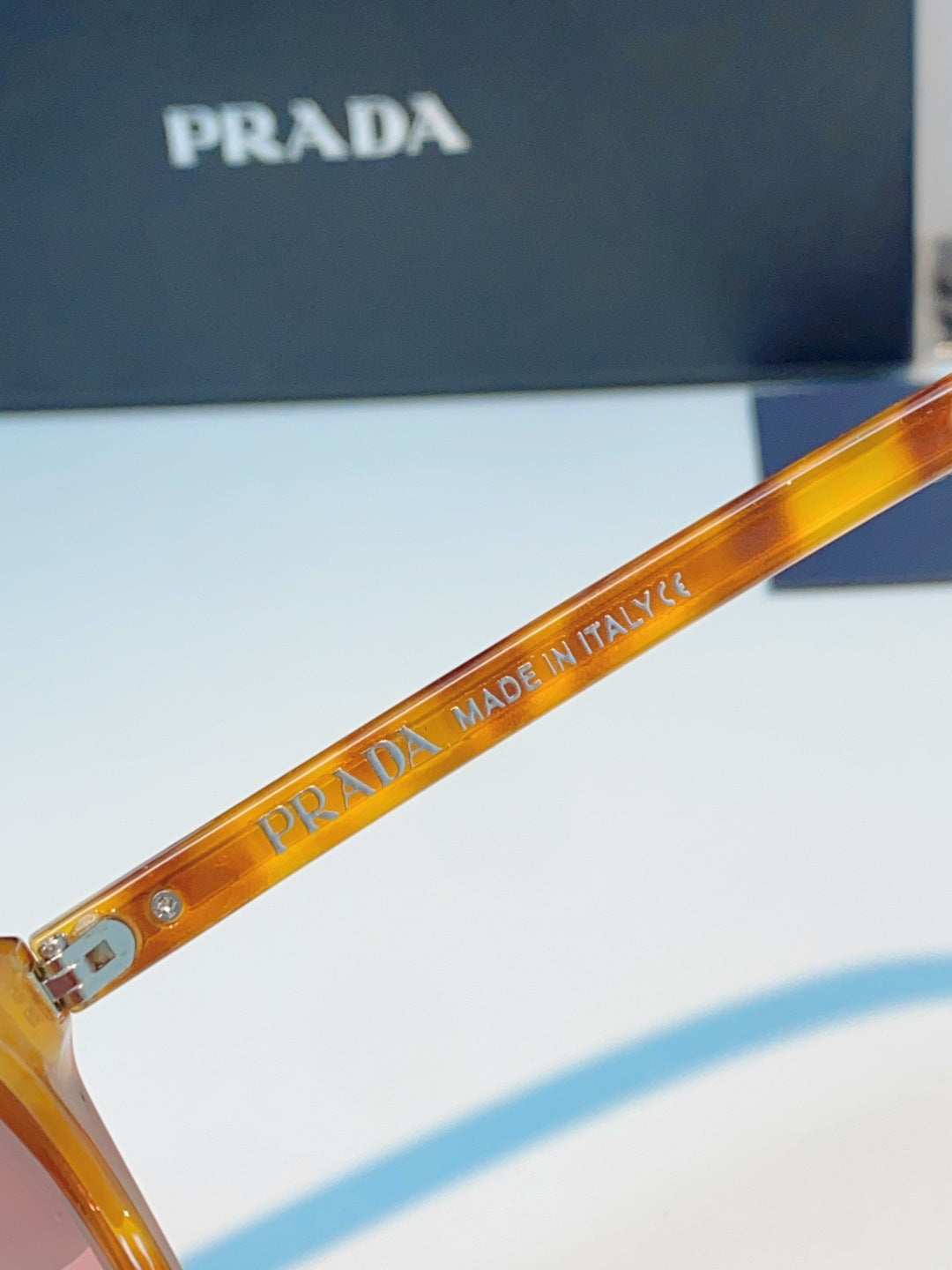 Prada Cat-Eye Orange Lens Sunglasses for Men & Women - detail image 8