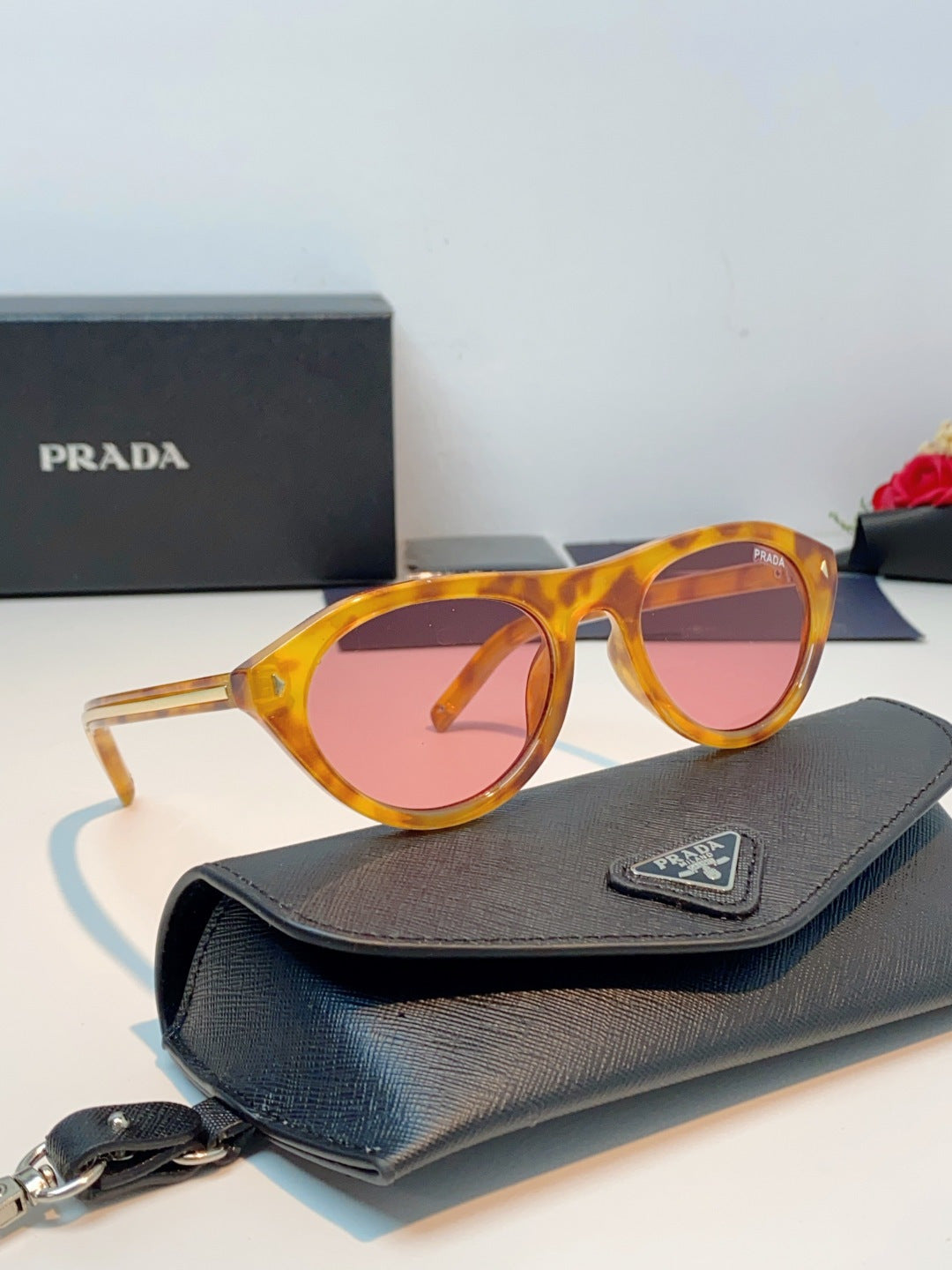 Prada Cat-Eye Orange Lens Sunglasses for Men & Women - detail image 10