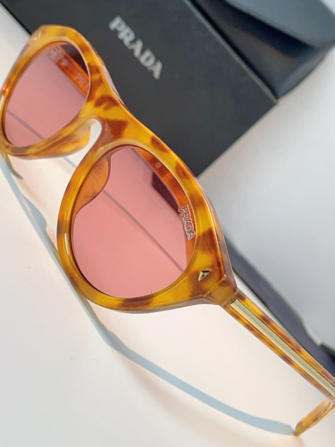 Prada Cat-Eye Orange Lens Sunglasses for Men & Women - detail image 7