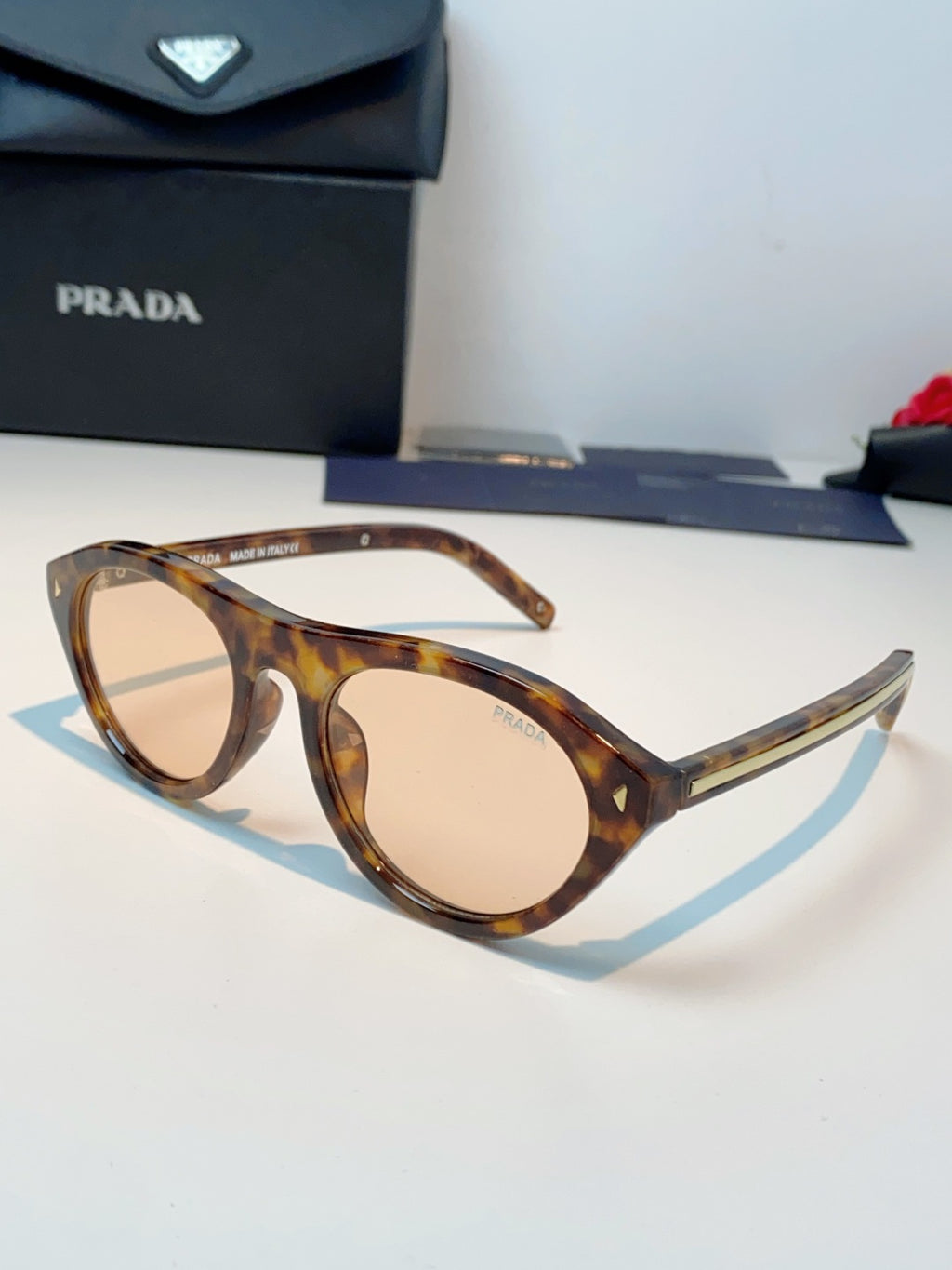 Prada Cat-Eye Gold Lens Sunglasses for Men & Women