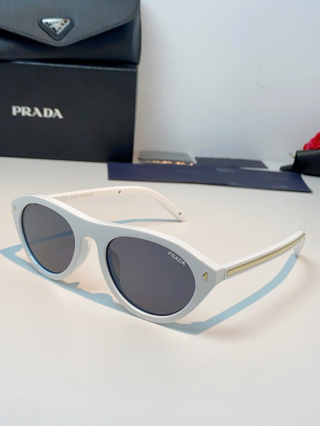 Prada Cat-Eye Silver Lens Sunglasses for Men & Women - 132505