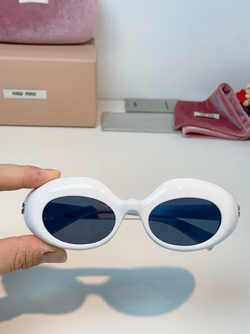 Miu Miu Metal Cat-Eye Blue Lens Sunglasses for Women - detail image 4