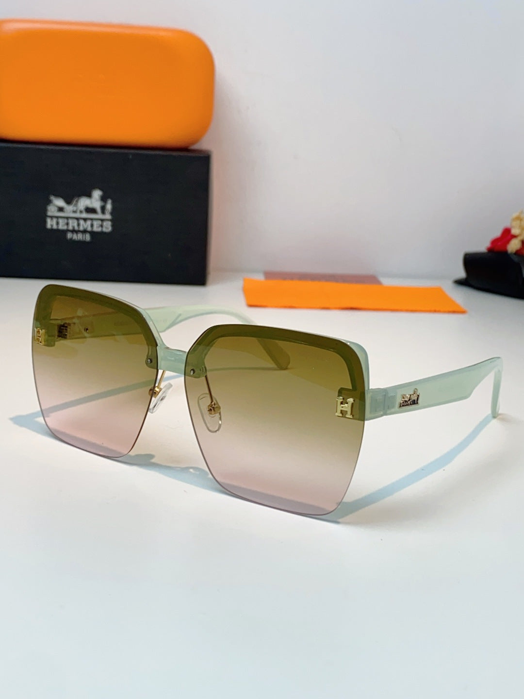 Hermès Lightweight Rimless Brown Lens Sunglasses for Men & Women - 416519