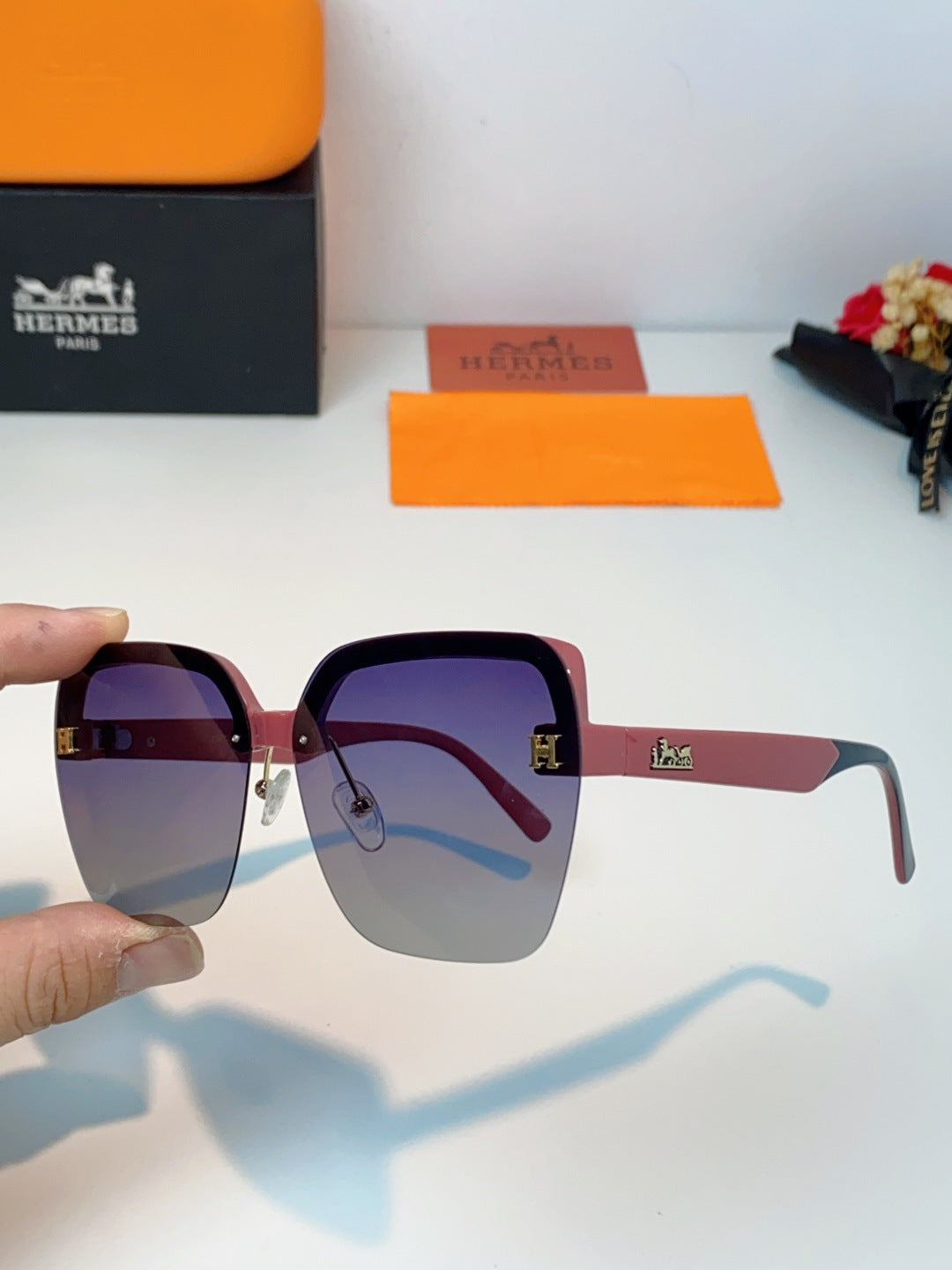Hermès Lightweight Rimless Red Lens Sunglasses for Men & Women - detail image 6
