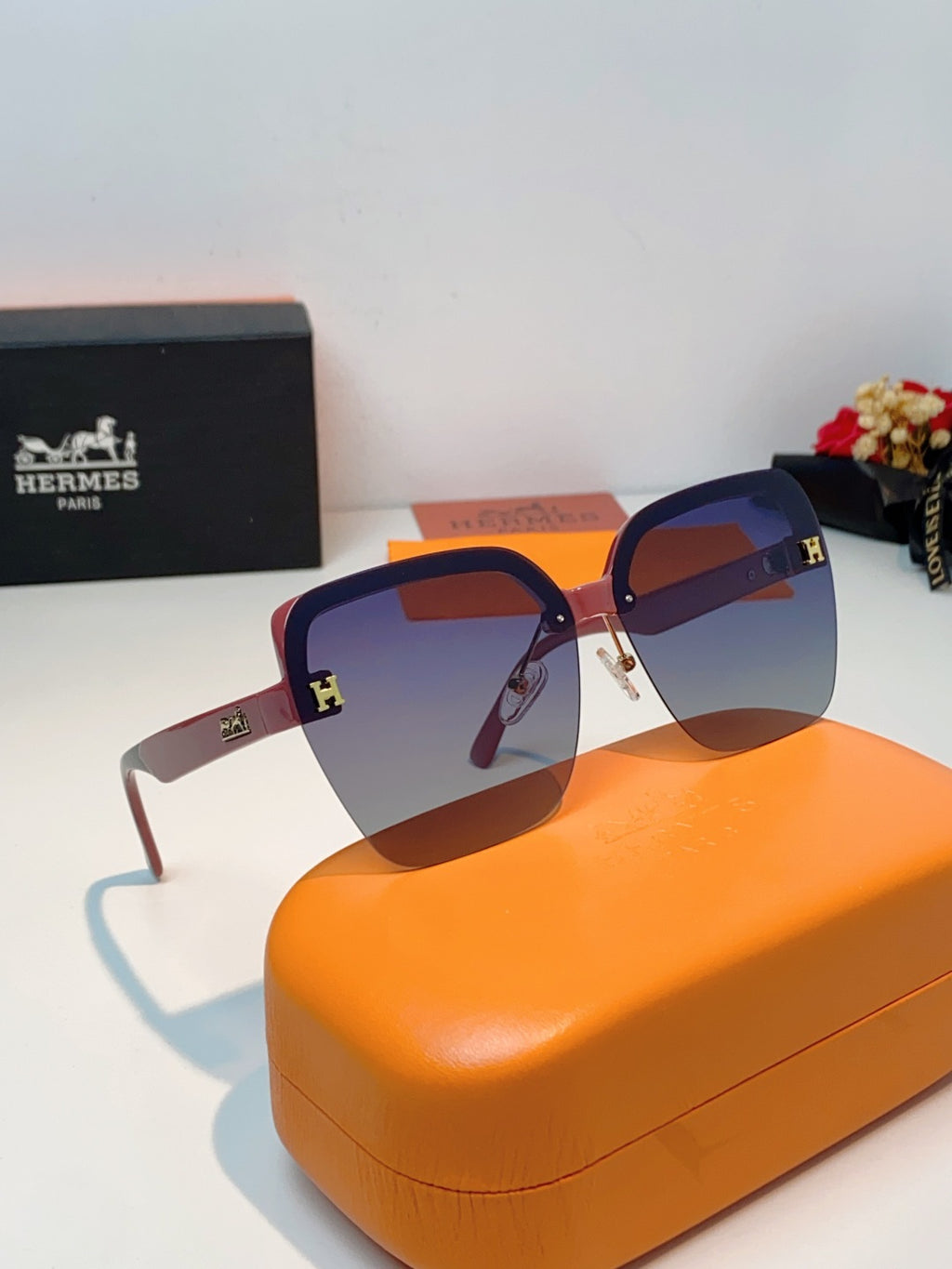 Hermès Lightweight Rimless Red Lens Sunglasses for Men & Women - detail image 10
