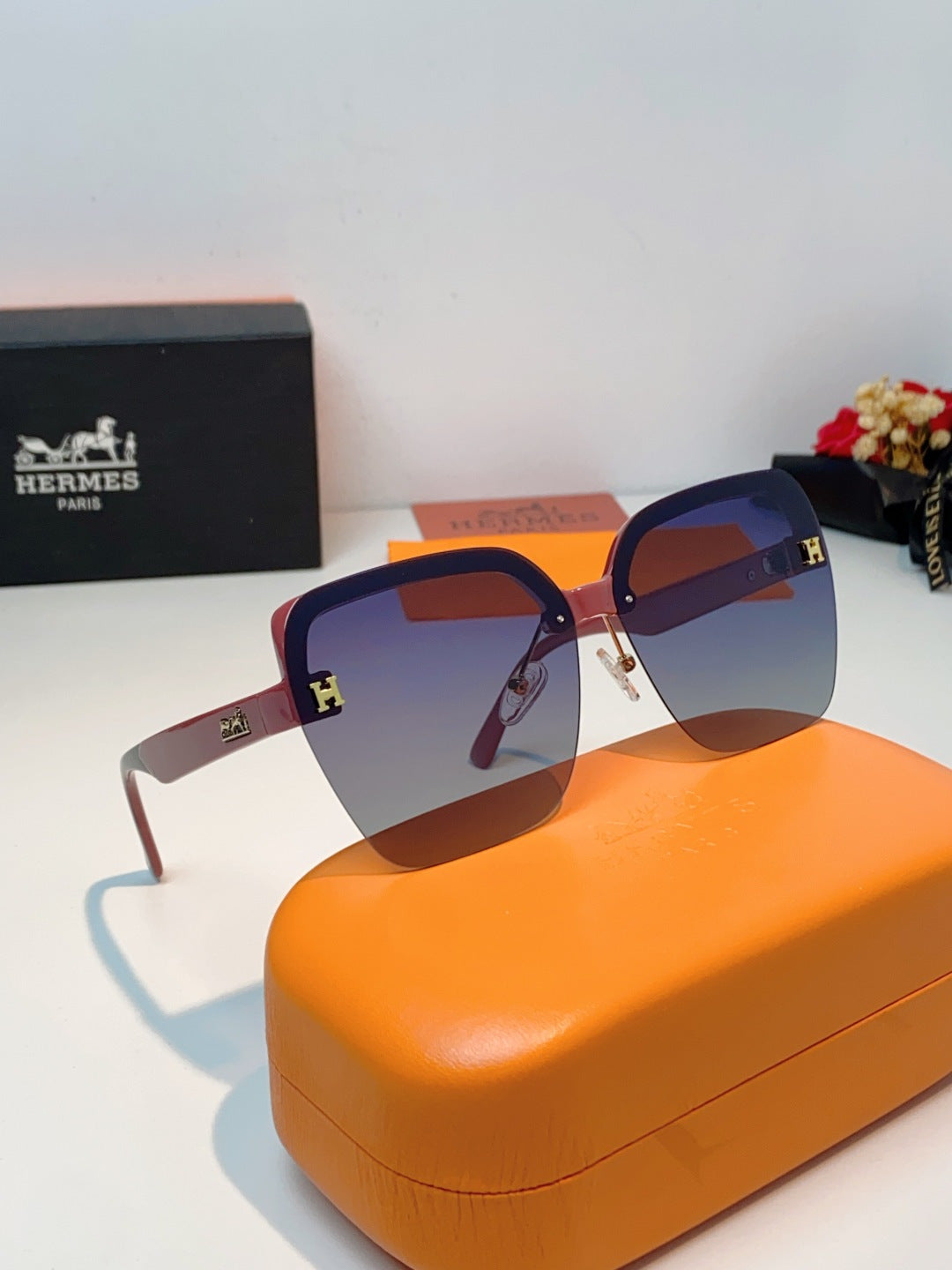 Hermès Lightweight Rimless Red Lens Sunglasses for Men & Women - detail image 10