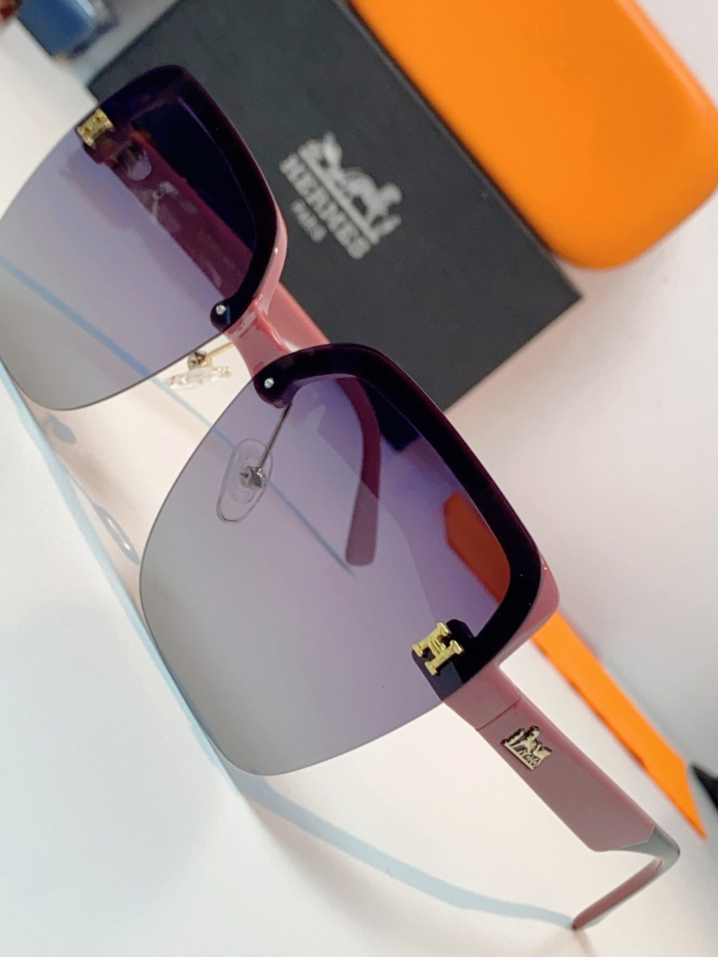 Hermès Lightweight Rimless Red Lens Sunglasses for Men & Women - detail image 7
