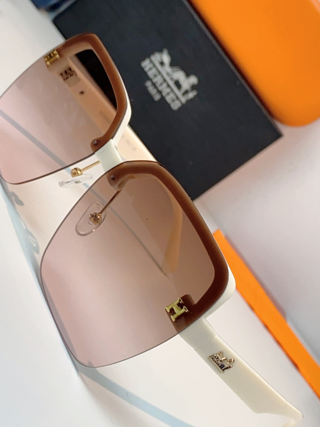Hermès Lightweight Rimless Brown Lens Sunglasses for Men & Women - detail image 7
