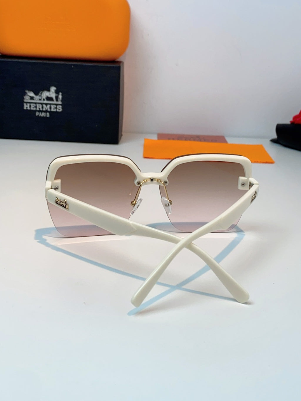 Hermès Lightweight Rimless Brown Lens Sunglasses for Men & Women - detail image 3