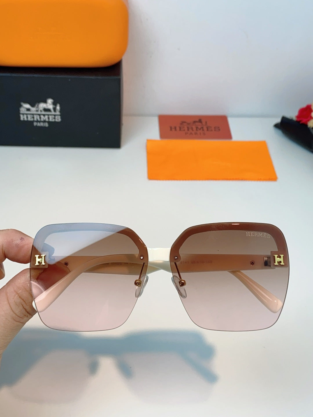Hermès Lightweight Rimless Brown Lens Sunglasses for Men & Women - detail image 4