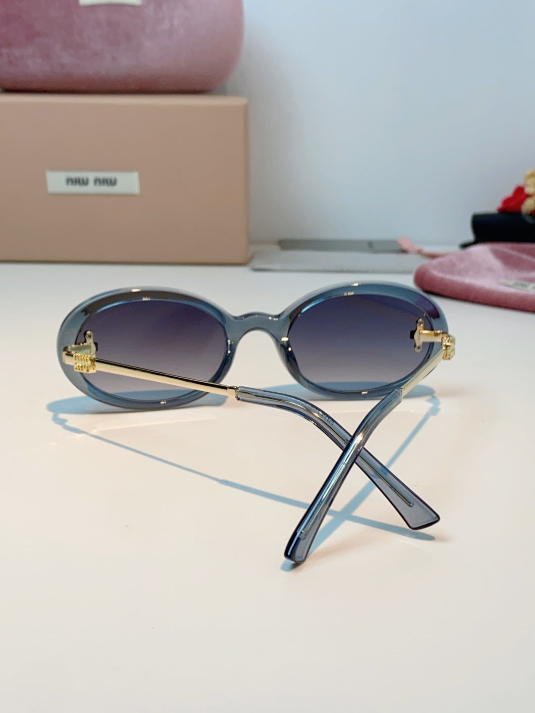 Miu Miu Metal Round Gray Lens Sunglasses for Men & Women - detail image 3