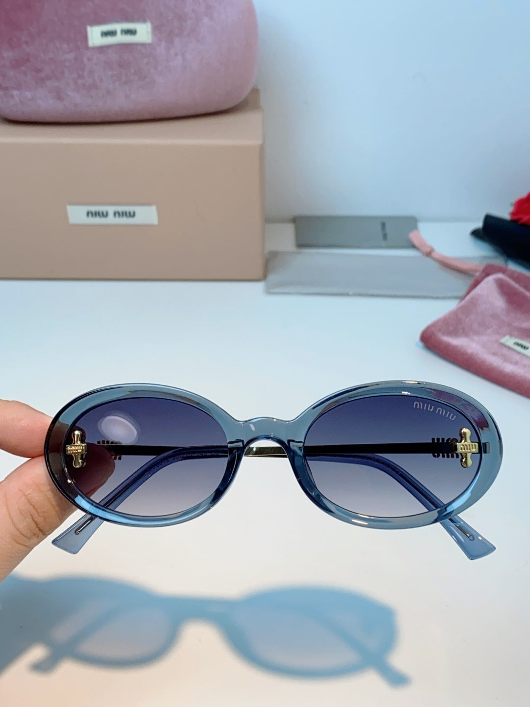 Miu Miu Metal Round Gray Lens Sunglasses for Men & Women - detail image 4