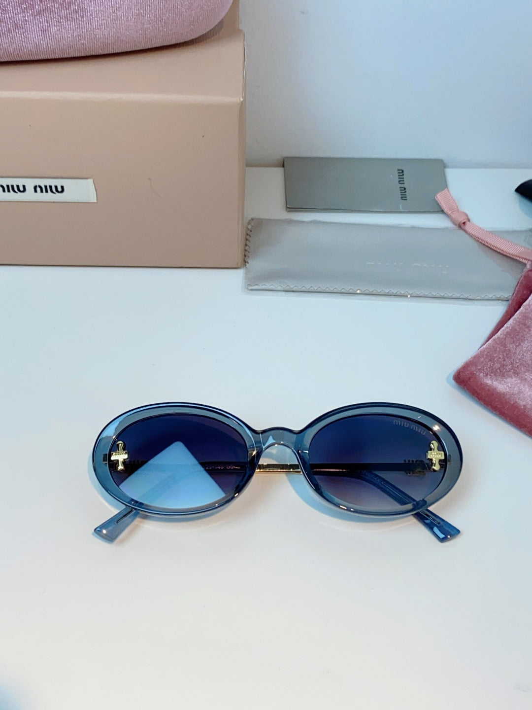 Miu Miu Metal Round Gray Lens Sunglasses for Men & Women - detail image 9