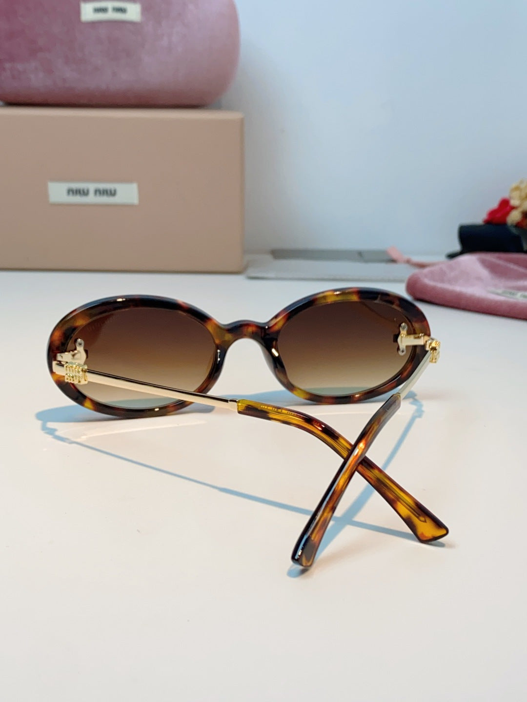 Miu Miu Metal Round Brown Lens Sunglasses for Men & Women - detail image 3