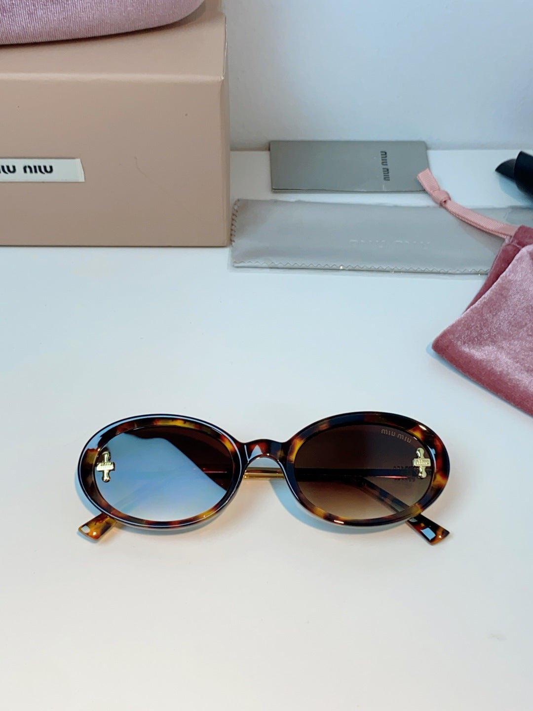 Miu Miu Metal Round Brown Lens Sunglasses for Men & Women - detail image 9
