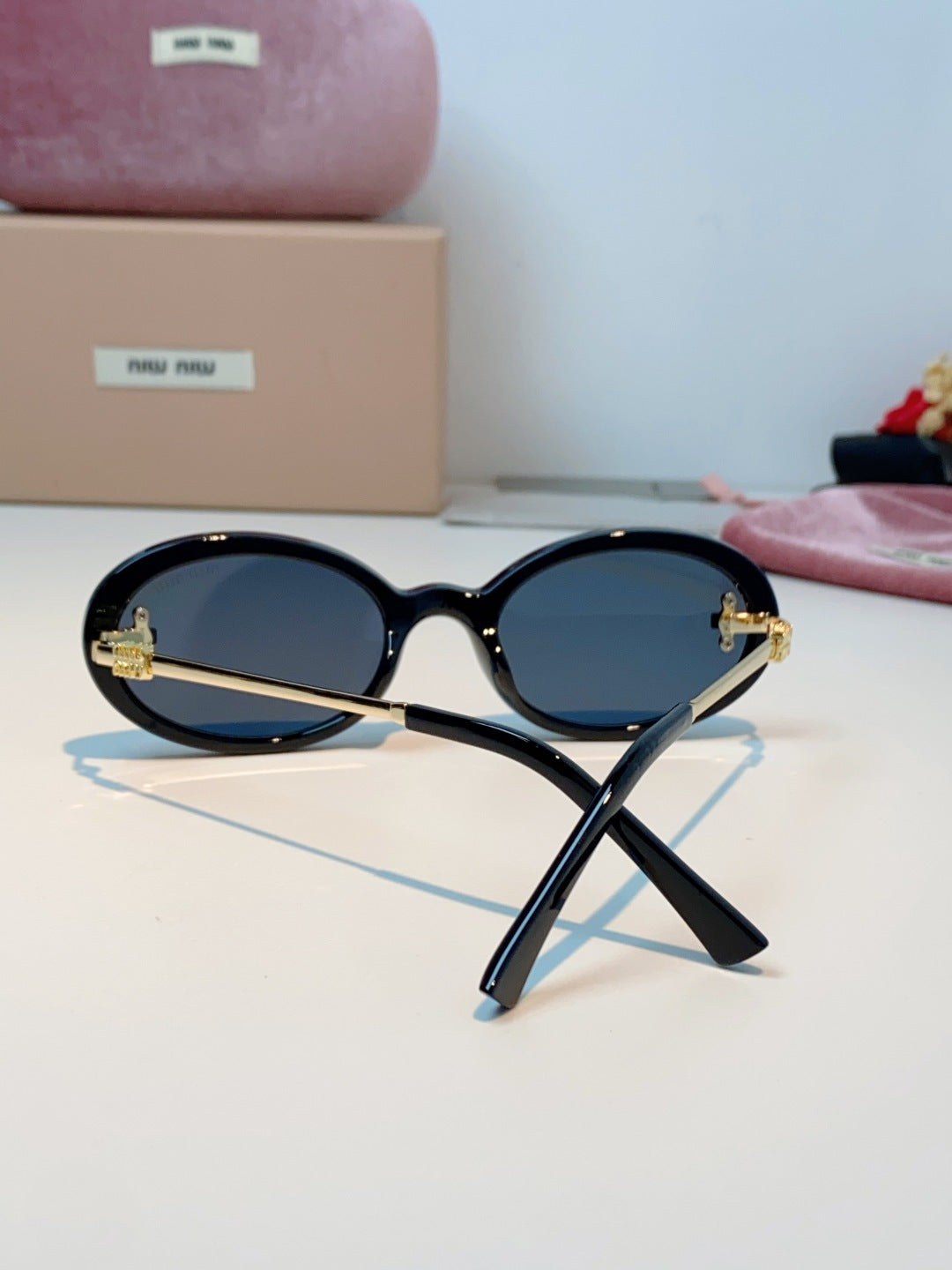 Miu Miu Metal Round Black Lens Sunglasses for Men & Women - detail image 3
