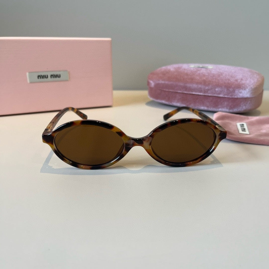 Miu Miu Round Brown Lens Sunglasses for Men & Women - detail image 2