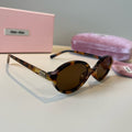 Miu Miu Round Brown Lens Sunglasses for Men & Women