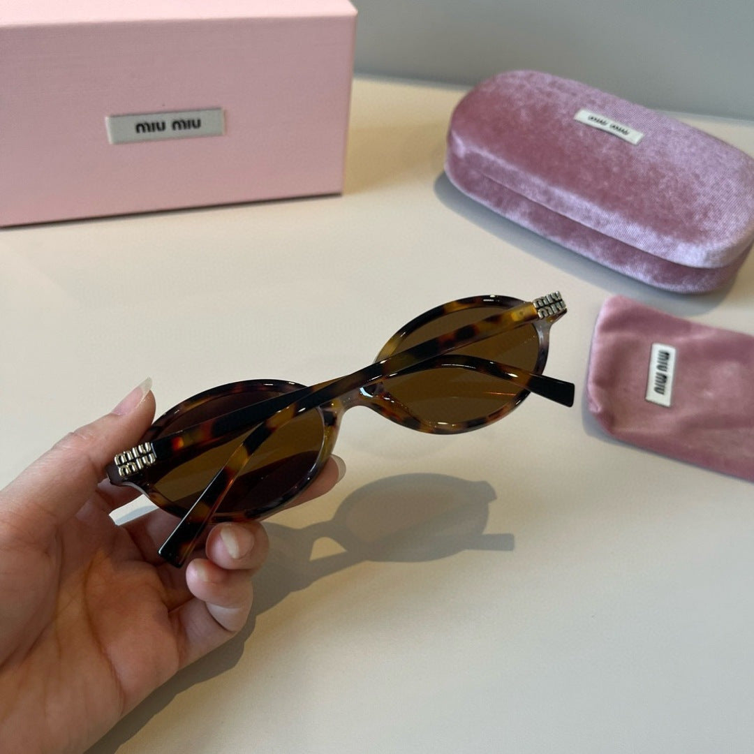 Miu Miu Round Brown Lens Sunglasses for Men & Women - detail image 7