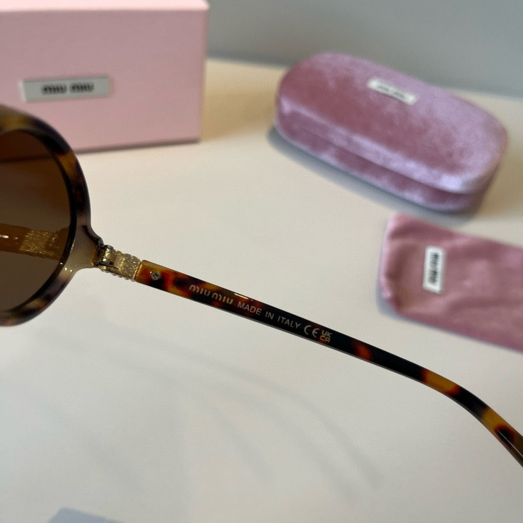 Miu Miu Round Brown Lens Sunglasses for Men & Women - detail image 5