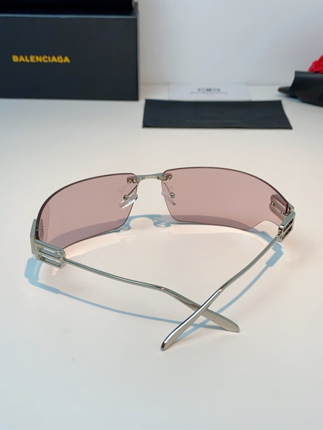 Balenciaga Lightweight Rimless Pink Lens Sunglasses for Men & Women - detail image 3