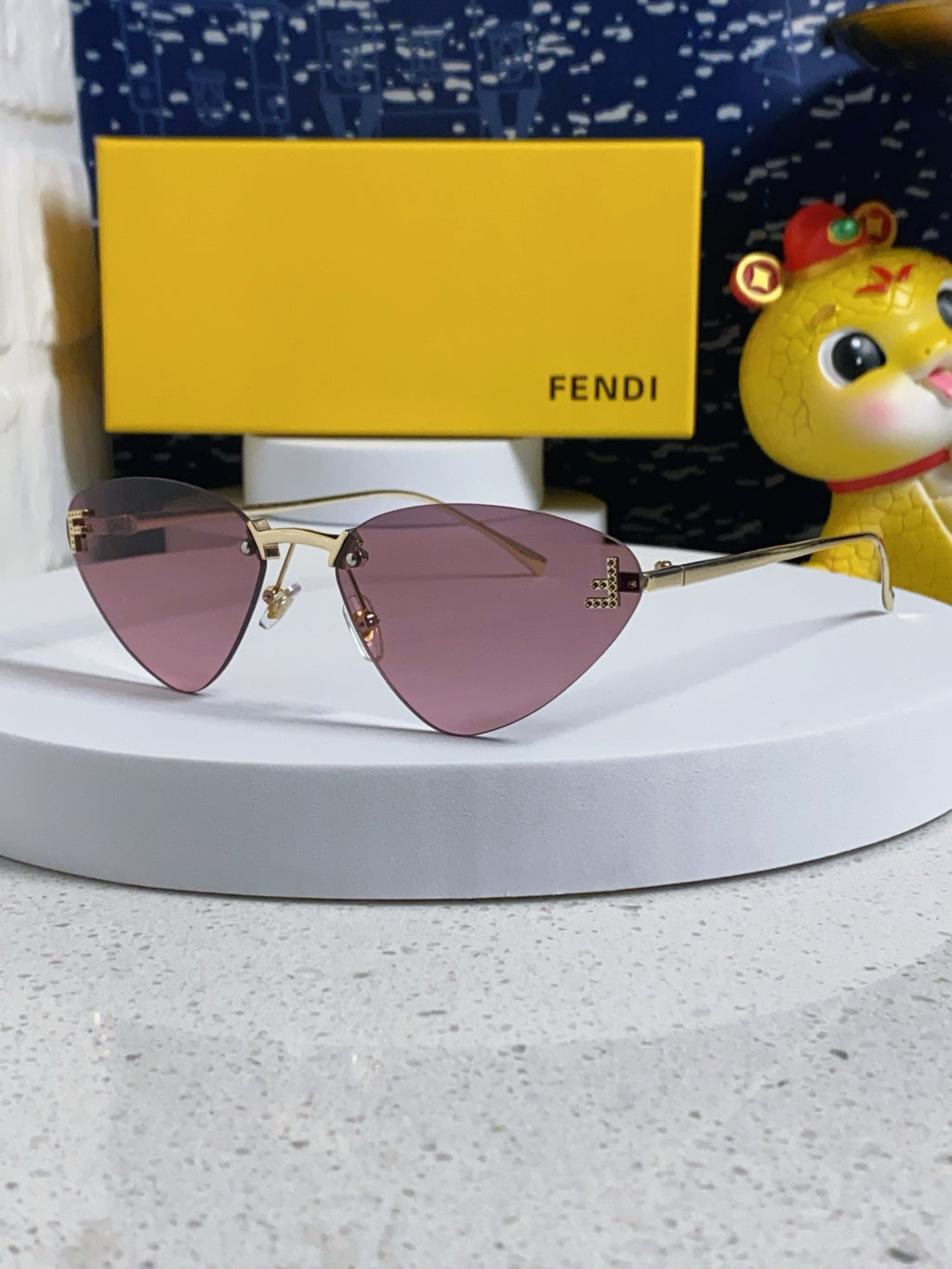 Fendi Lightweight Rimless Purple Lens Sunglasses for Women