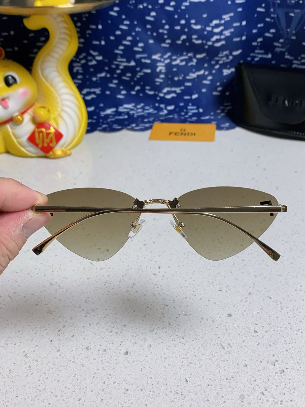 Fendi Lightweight Rimless Gray Lens Sunglasses for Women - detail image 5