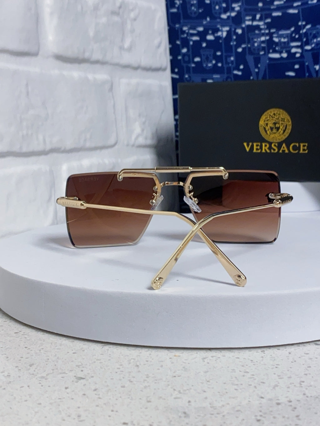 Versace Lightweight Rimless Red Lens Sunglasses for Men & Women - detail image 3