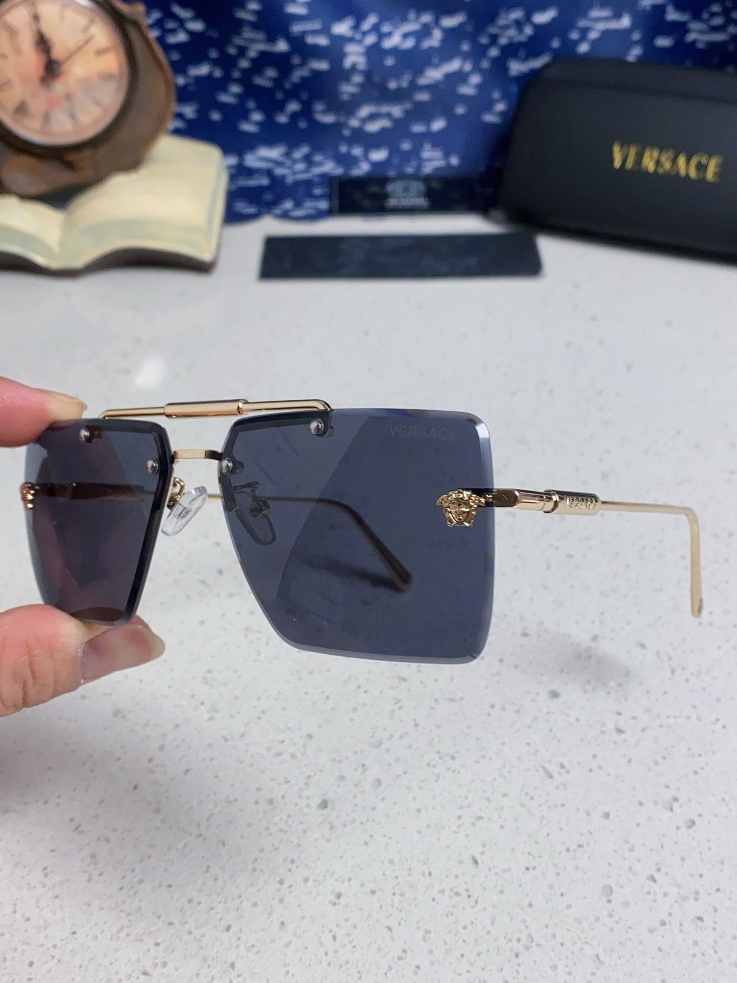 Versace Lightweight Rimless Blue Lens Sunglasses for Men & Women - detail image 6