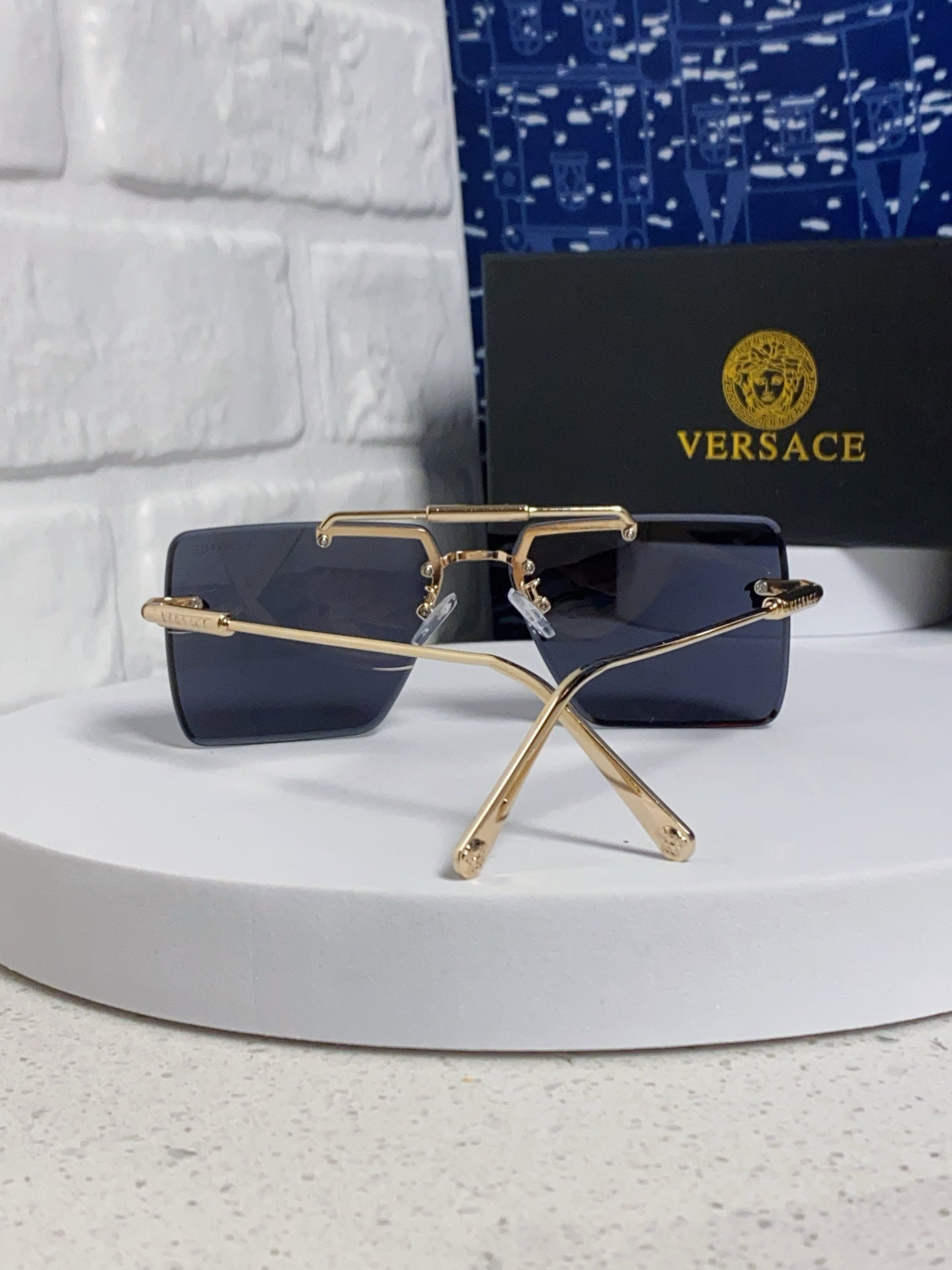 Versace Lightweight Rimless Blue Lens Sunglasses for Men & Women - detail image 3