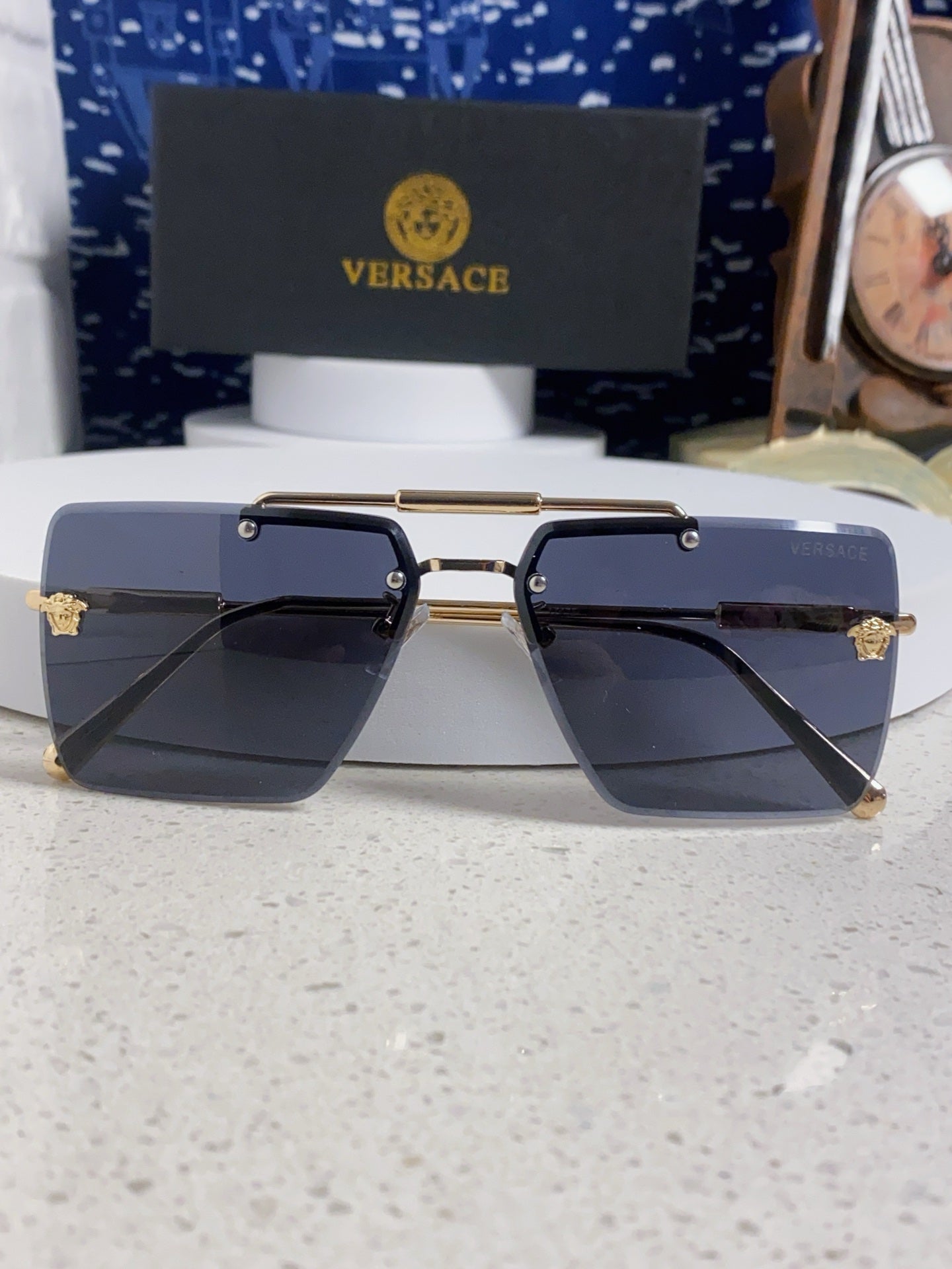 Versace Lightweight Rimless Blue Lens Sunglasses for Men & Women - detail image 9