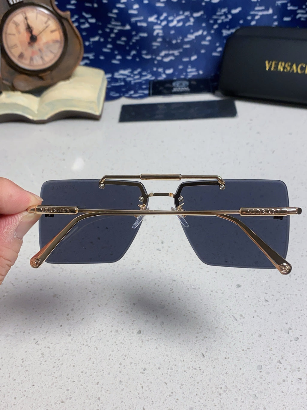 Versace Lightweight Rimless Blue Lens Sunglasses for Men & Women - detail image 5