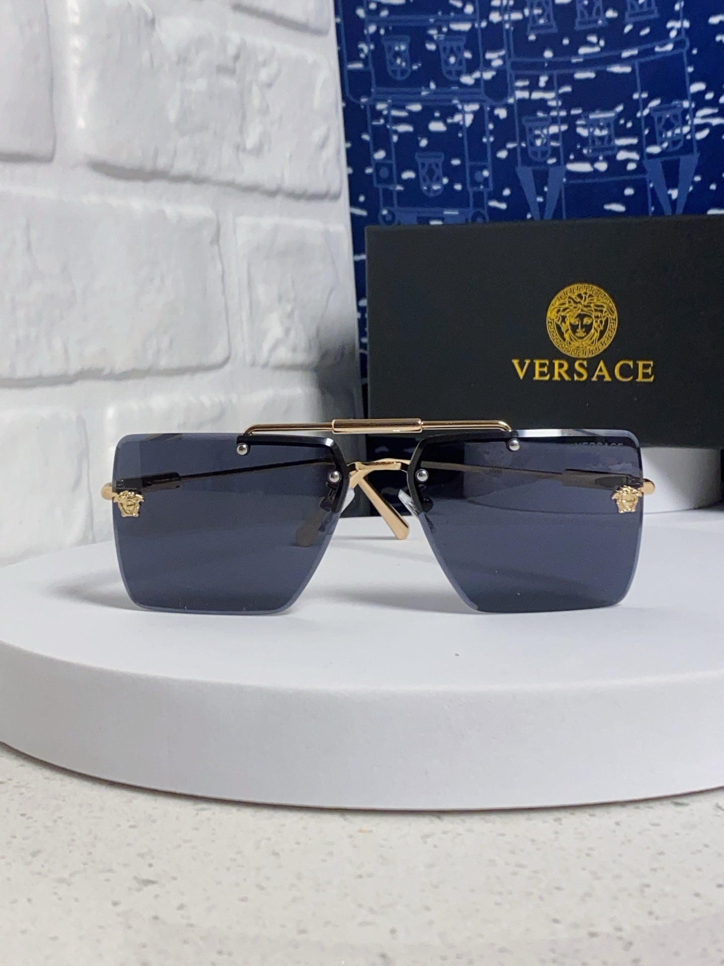 Versace Lightweight Rimless Blue Lens Sunglasses for Men & Women - detail image 2