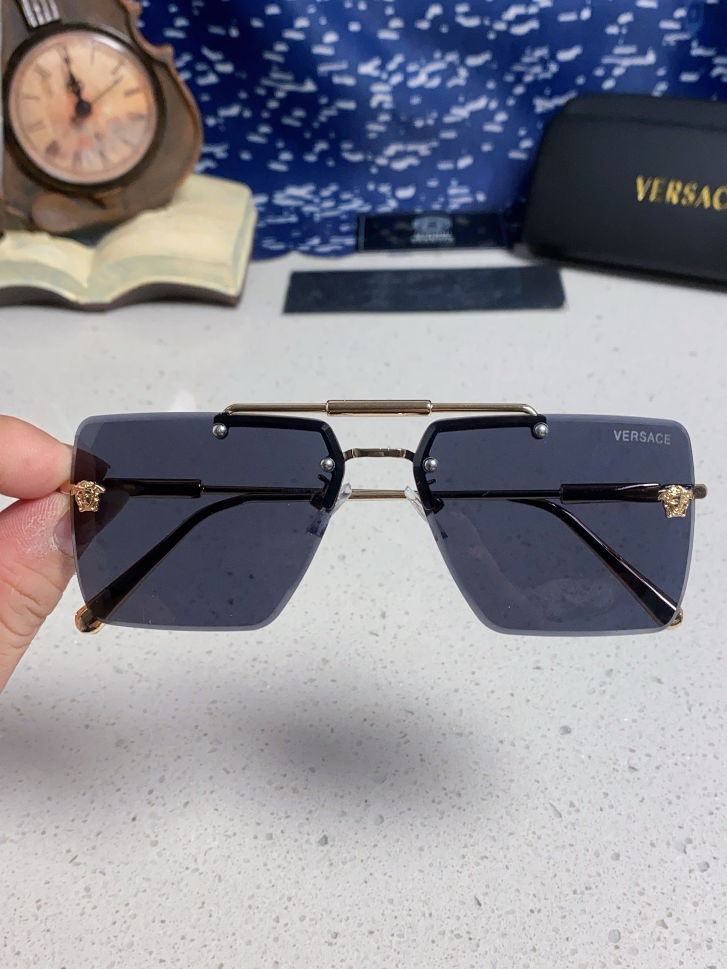 Versace Lightweight Rimless Blue Lens Sunglasses for Men & Women - detail image 4