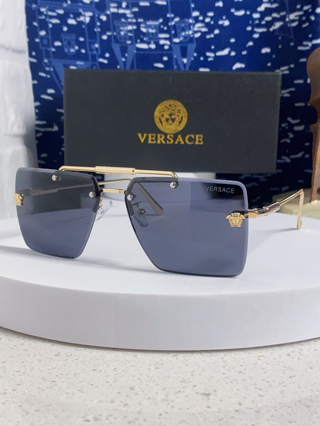 Versace Lightweight Rimless Blue Lens Sunglasses for Men & Women