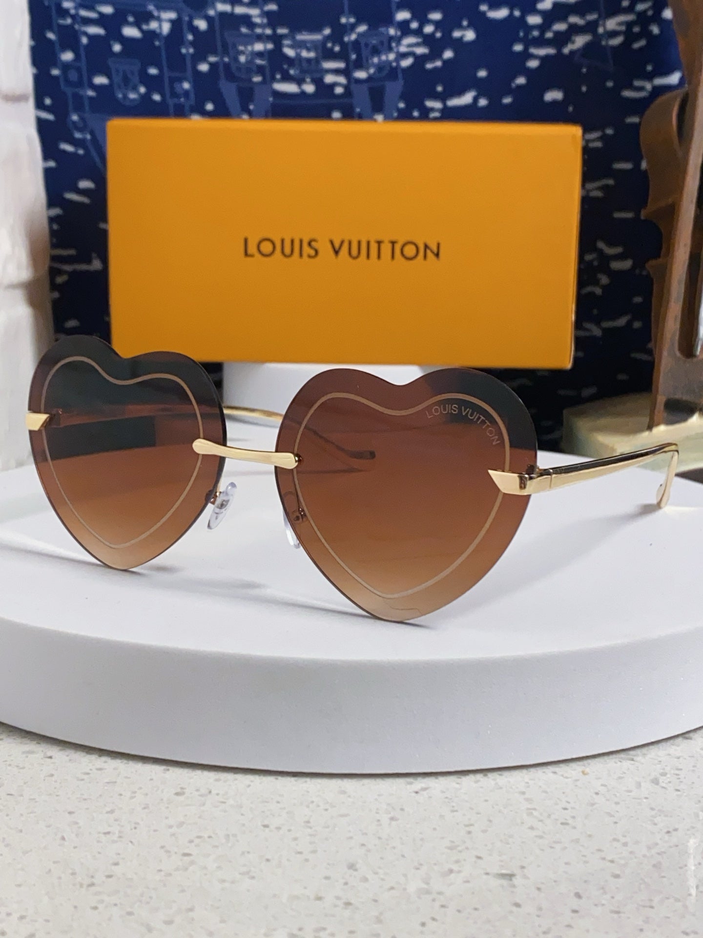 Louis Vuitton Lightweight Rimless Brown Lens Sunglasses for Women